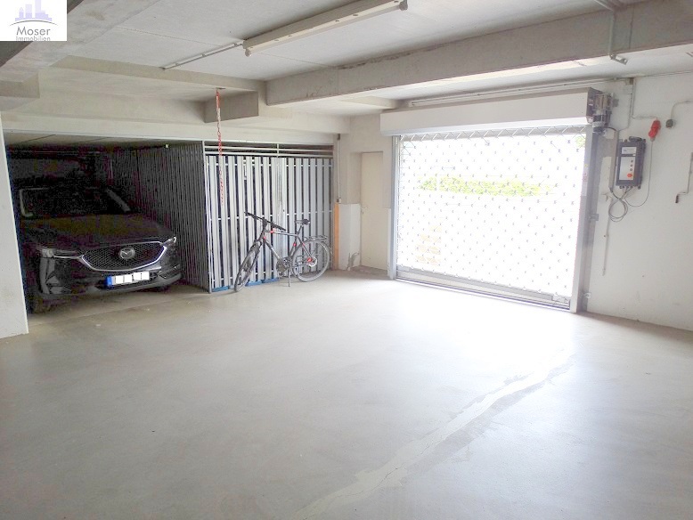 Hochwertige 3-Zimmer Gartenwohnung mit Terrasse + Einbauküche + Tiefgaragenplatz – ruhig in FFM-Oberad